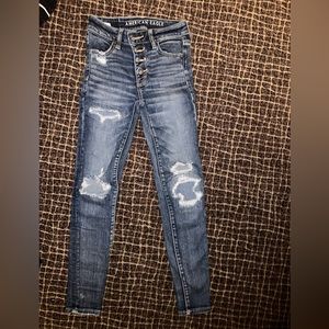 American Eagle size 0 skinny jeans with light rips